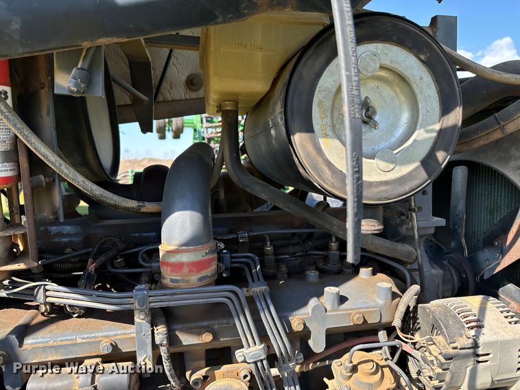 image for item ND9219 1999 New Holland TV140 bi-directional tractor