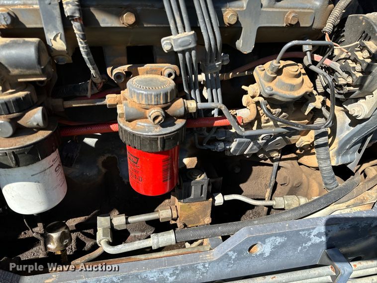 image for item ND9219 1999 New Holland TV140 bi-directional tractor