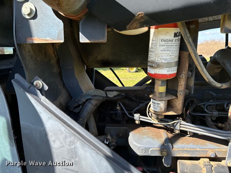 image for item ND9219 1999 New Holland TV140 bi-directional tractor