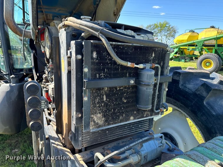 image for item ND9219 1999 New Holland TV140 bi-directional tractor