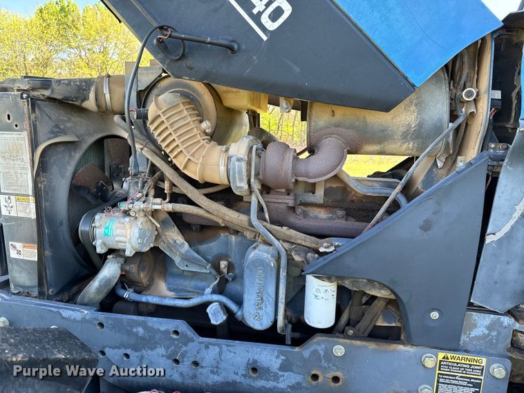 image for item ND9219 1999 New Holland TV140 bi-directional tractor