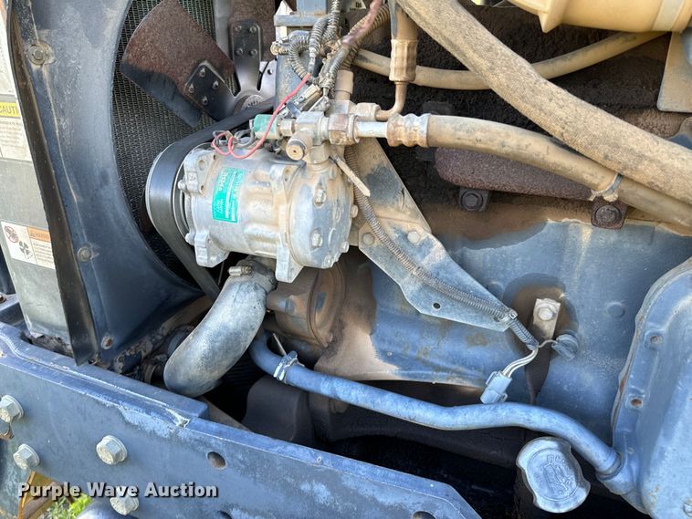 image for item ND9219 1999 New Holland TV140 bi-directional tractor