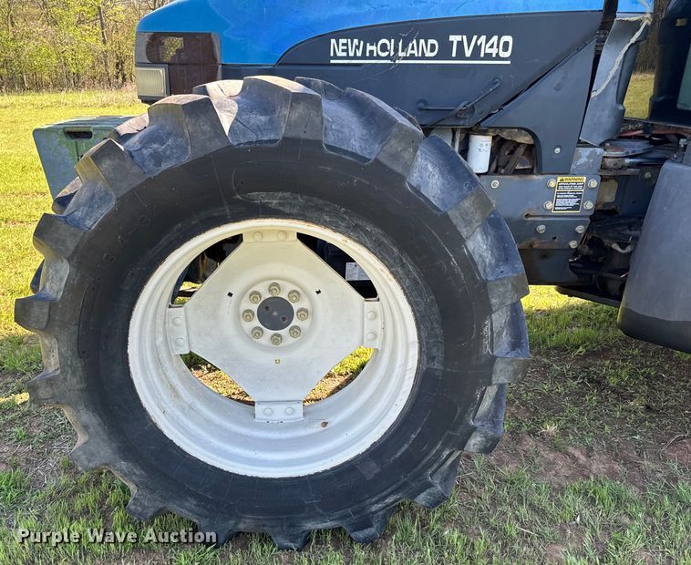 image for item ND9219 1999 New Holland TV140 bi-directional tractor