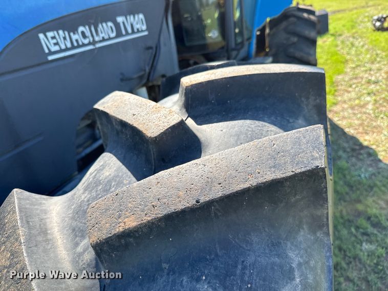 image for item ND9219 1999 New Holland TV140 bi-directional tractor