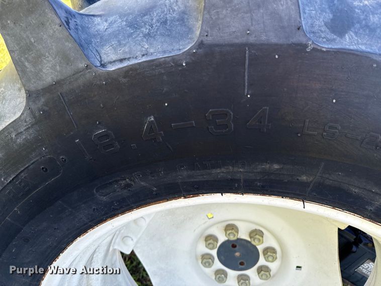 image for item ND9219 1999 New Holland TV140 bi-directional tractor