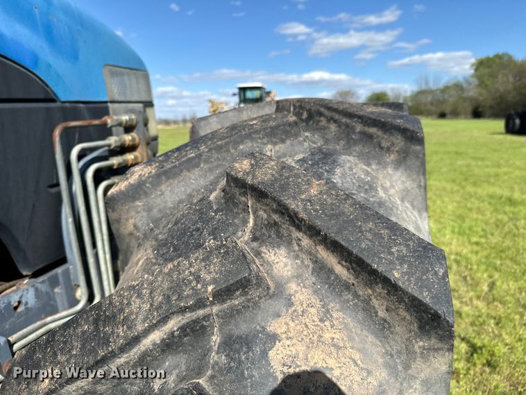 image for item ND9219 1999 New Holland TV140 bi-directional tractor