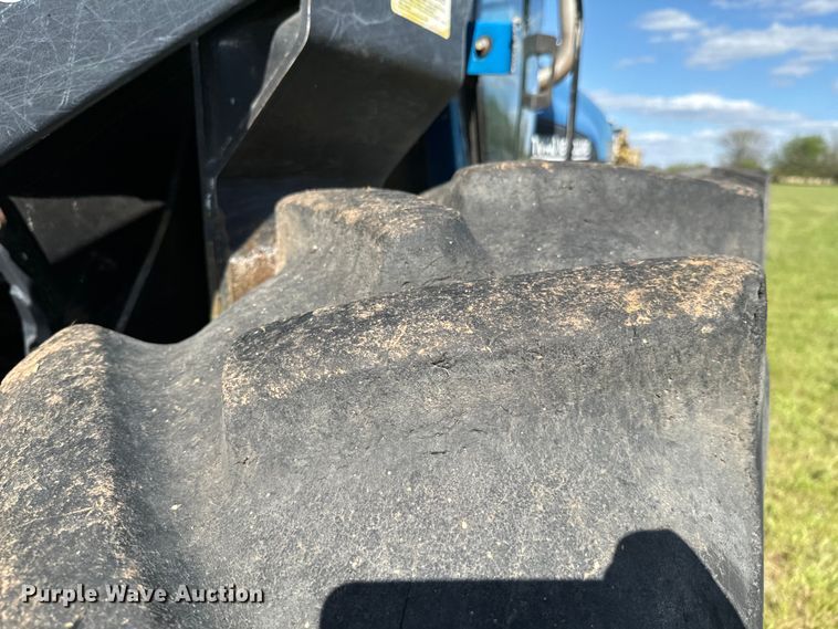 image for item ND9219 1999 New Holland TV140 bi-directional tractor