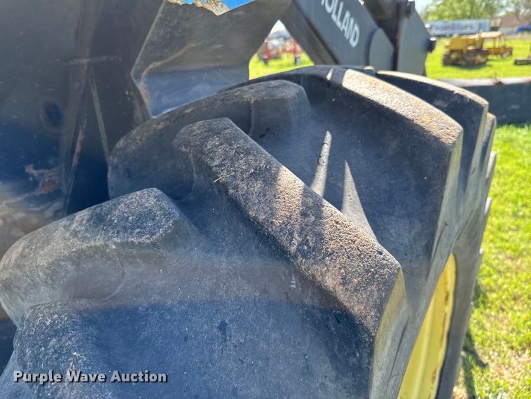 image for item ND9219 1999 New Holland TV140 bi-directional tractor