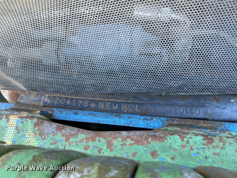 image for item ND9219 1999 New Holland TV140 bi-directional tractor
