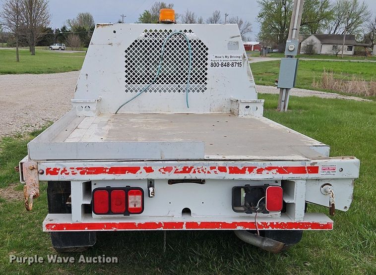 image for item EI3719 2015 Nissan Frontier  flatbed pickup truck