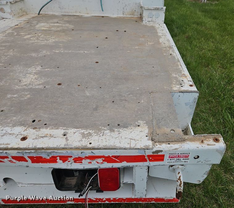 image for item EI3719 2015 Nissan Frontier  flatbed pickup truck