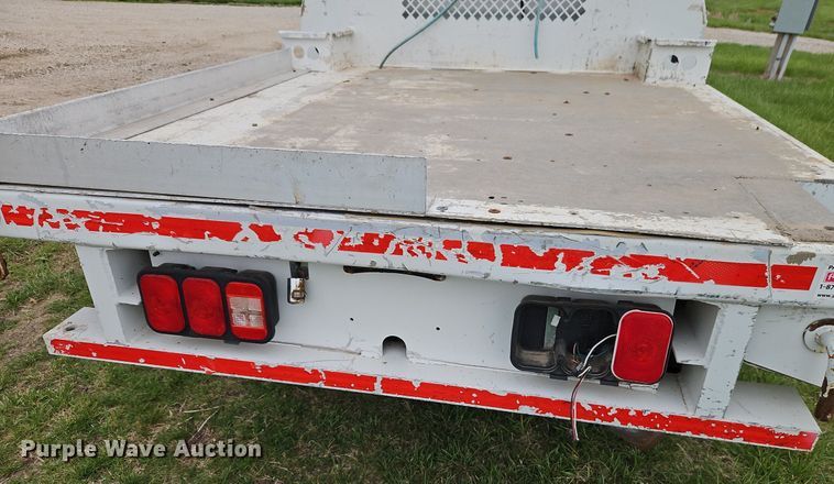 image for item EI3719 2015 Nissan Frontier  flatbed pickup truck