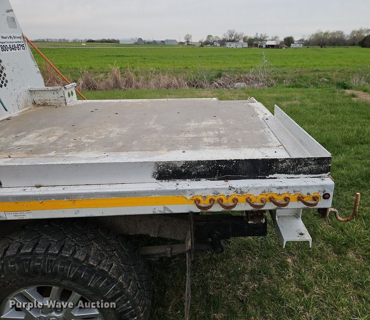 image for item EI3719 2015 Nissan Frontier  flatbed pickup truck