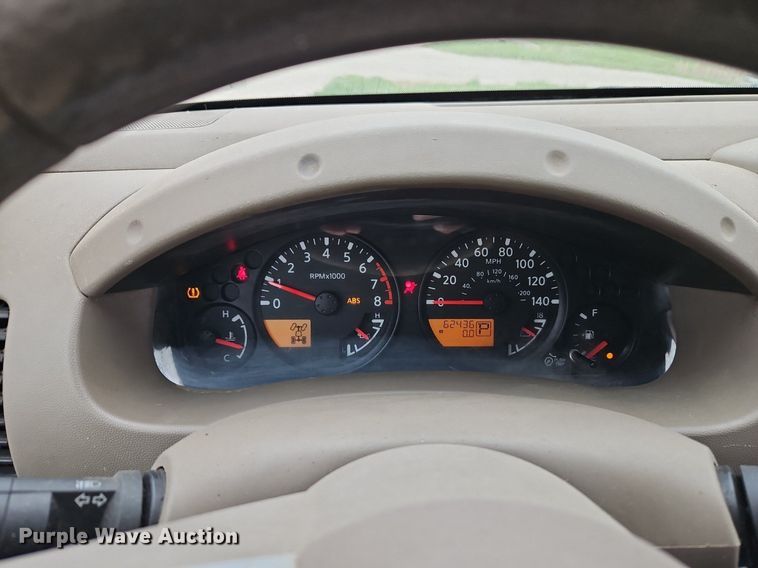 image for item EI3719 2015 Nissan Frontier  flatbed pickup truck