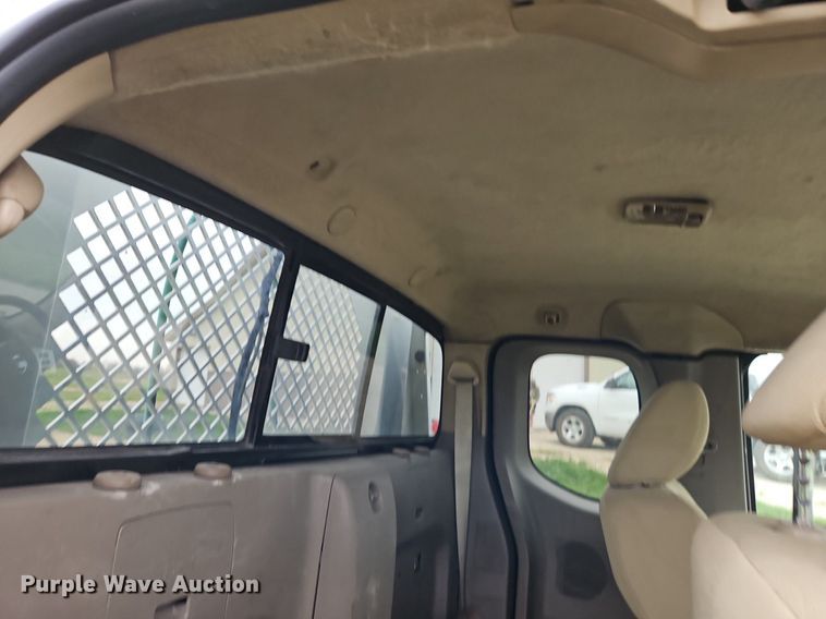 image for item EI3719 2015 Nissan Frontier  flatbed pickup truck