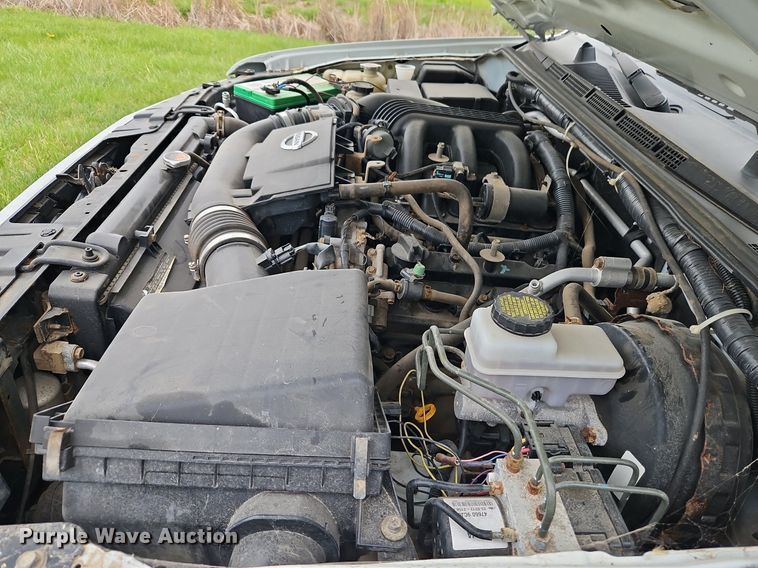 image for item EI3719 2015 Nissan Frontier  flatbed pickup truck