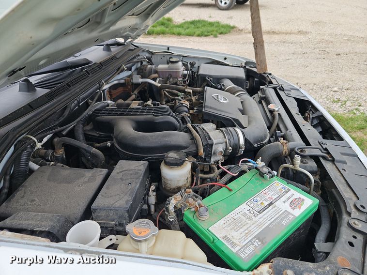 image for item EI3719 2015 Nissan Frontier  flatbed pickup truck