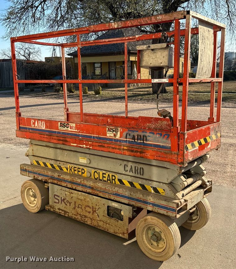 image for item NH9011 1997 SkyJack SJ3220 scissor lift