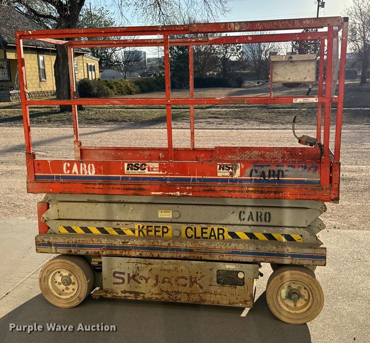 image for item NH9011 1997 SkyJack SJ3220 scissor lift