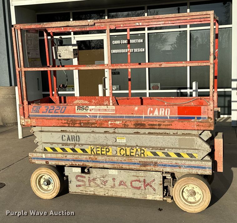 image for item NH9011 1997 SkyJack SJ3220 scissor lift