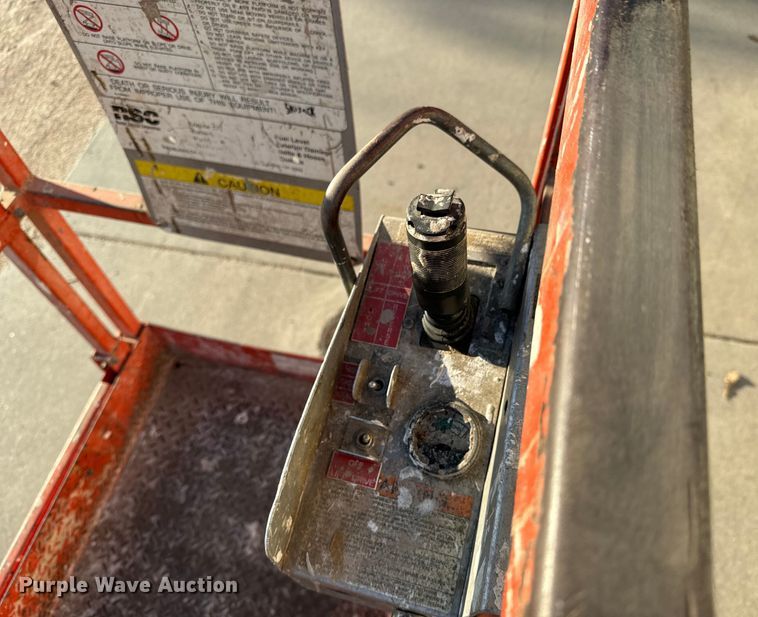 image for item NH9011 1997 SkyJack SJ3220 scissor lift