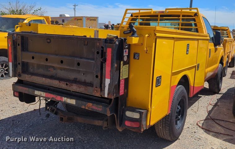 image for item NZ9586 2015 Ford F350 Super Duty utility bed pickup truck