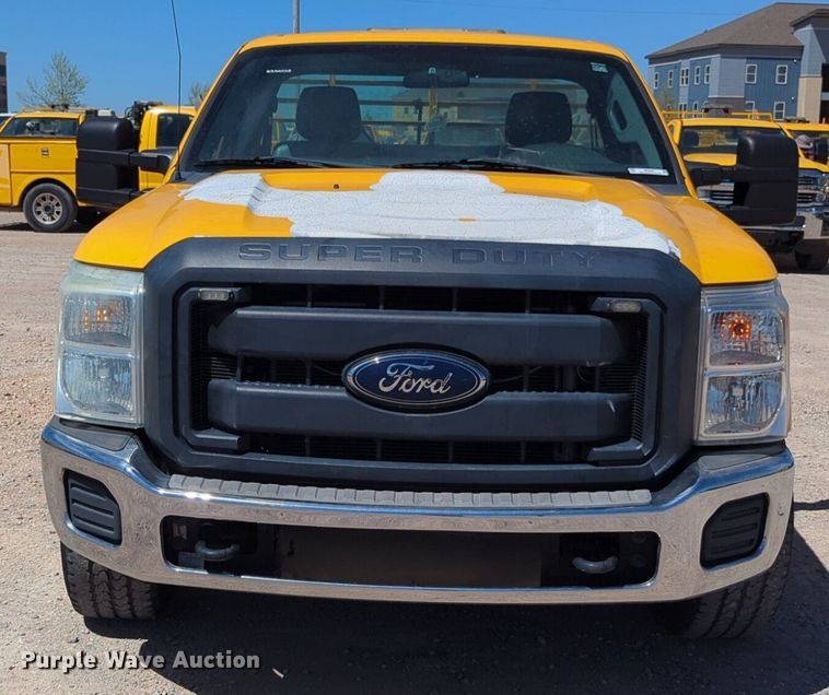 image for item NZ9587 2014 Ford F350 Super Duty utility bed pickup truck