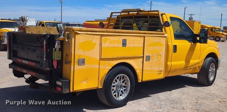 image for item NZ9587 2014 Ford F350 Super Duty utility bed pickup truck