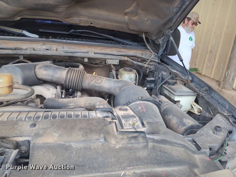 image for item NZ9636 2003 Ford F550 Crew Cab flatbed truck