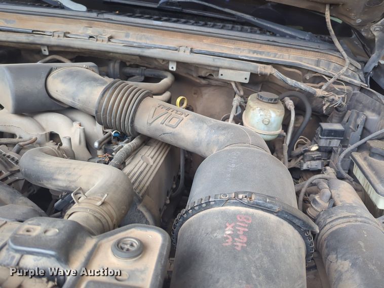 image for item NZ9636 2003 Ford F550 Crew Cab flatbed truck