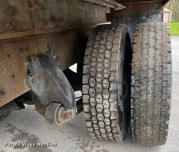 image for item OG9903 2001 Freightliner  FL70 flatbed truck