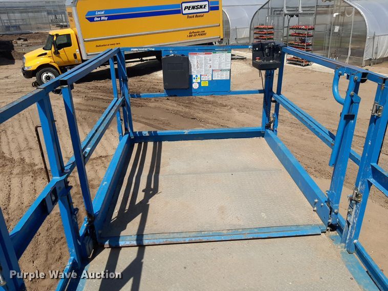 image for item DQ7028 2013 Genie GS-4390 RT scissor lift