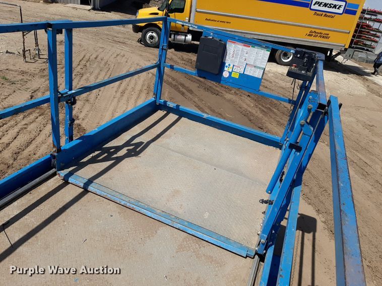 image for item DQ7028 2013 Genie GS-4390 RT scissor lift