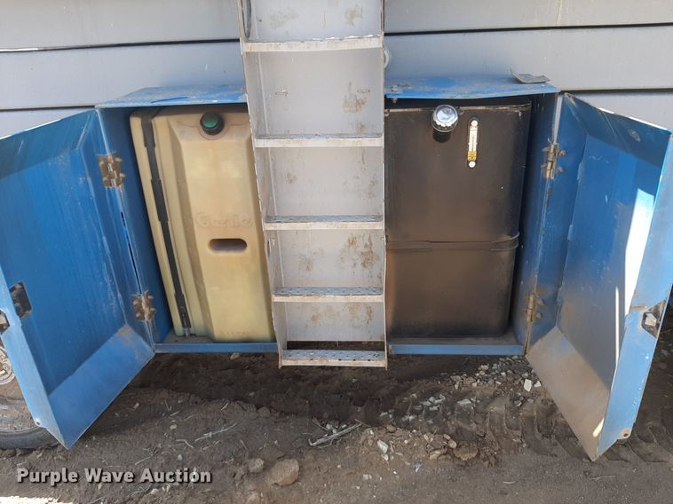 image for item DQ7028 2013 Genie GS-4390 RT scissor lift