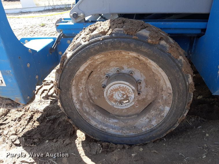 image for item DQ7028 2013 Genie GS-4390 RT scissor lift