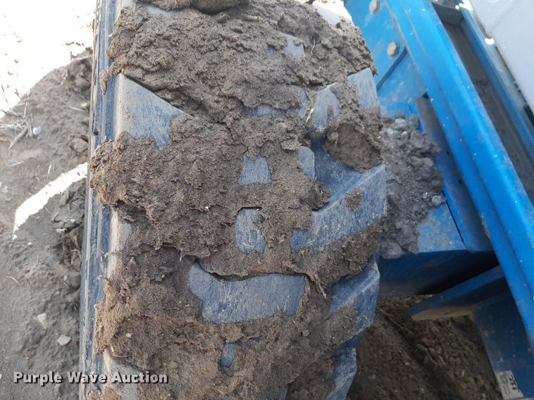 image for item DQ7028 2013 Genie GS-4390 RT scissor lift