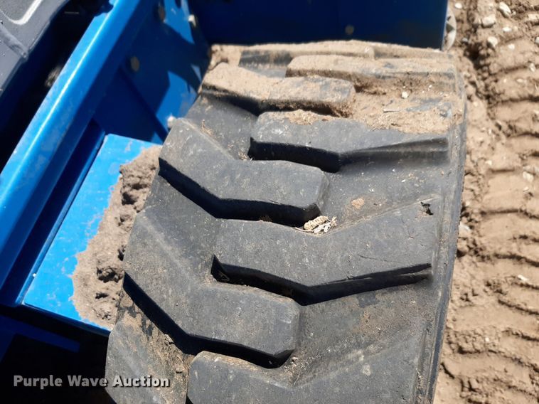 image for item DQ7028 2013 Genie GS-4390 RT scissor lift