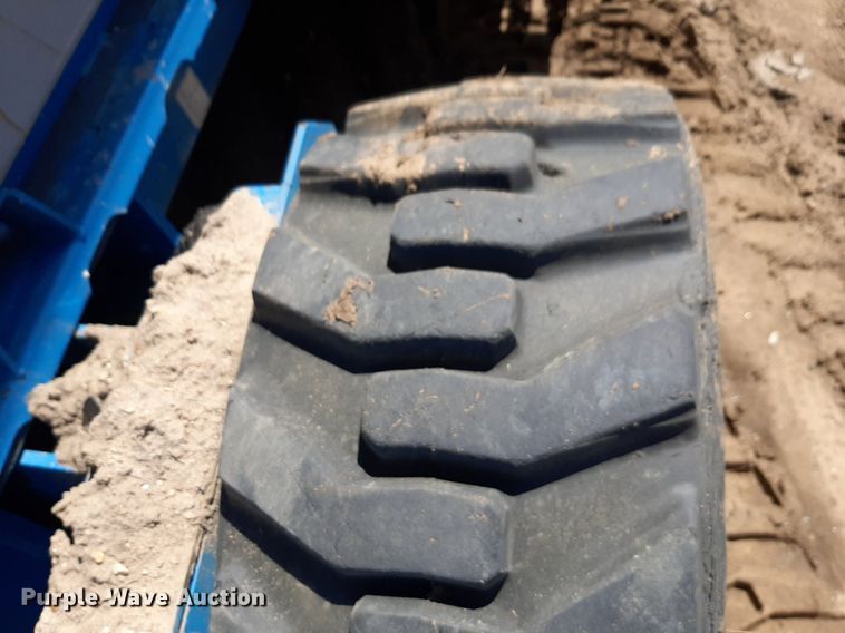 image for item DQ7028 2013 Genie GS-4390 RT scissor lift