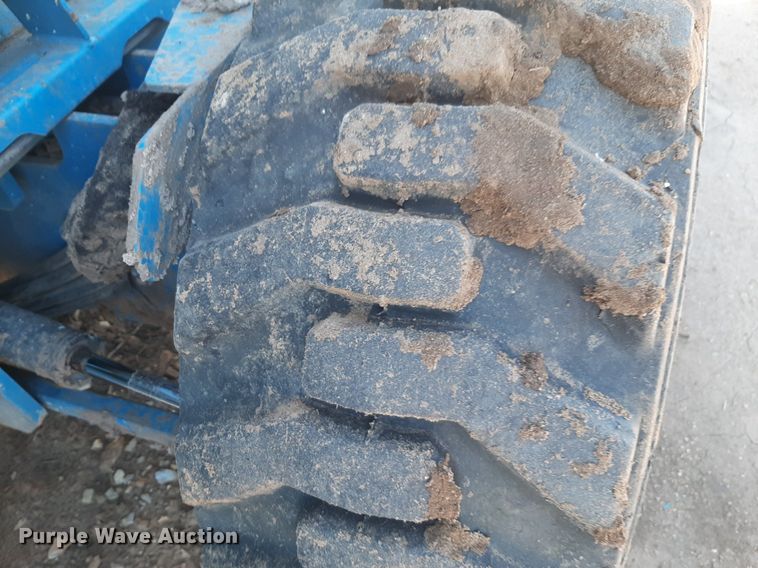 image for item DQ7028 2013 Genie GS-4390 RT scissor lift