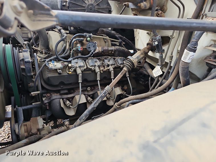 image for item EJ5360 1999 GMC C6500 chipper truck