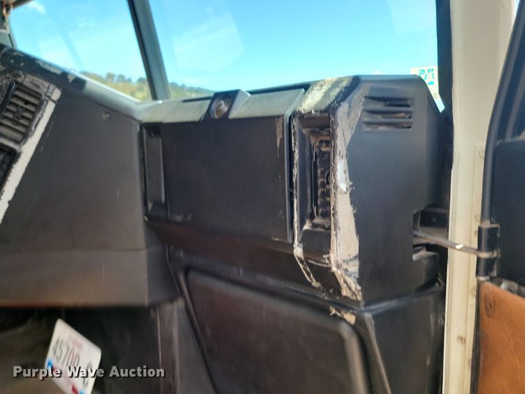 image for item NZ9765 1999 Freightliner  FL112 roll-off container truck