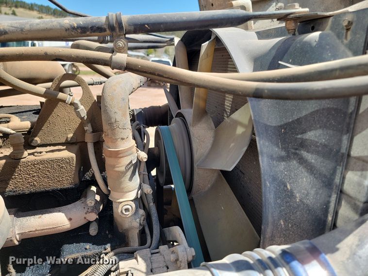 image for item NZ9765 1999 Freightliner  FL112 roll-off container truck