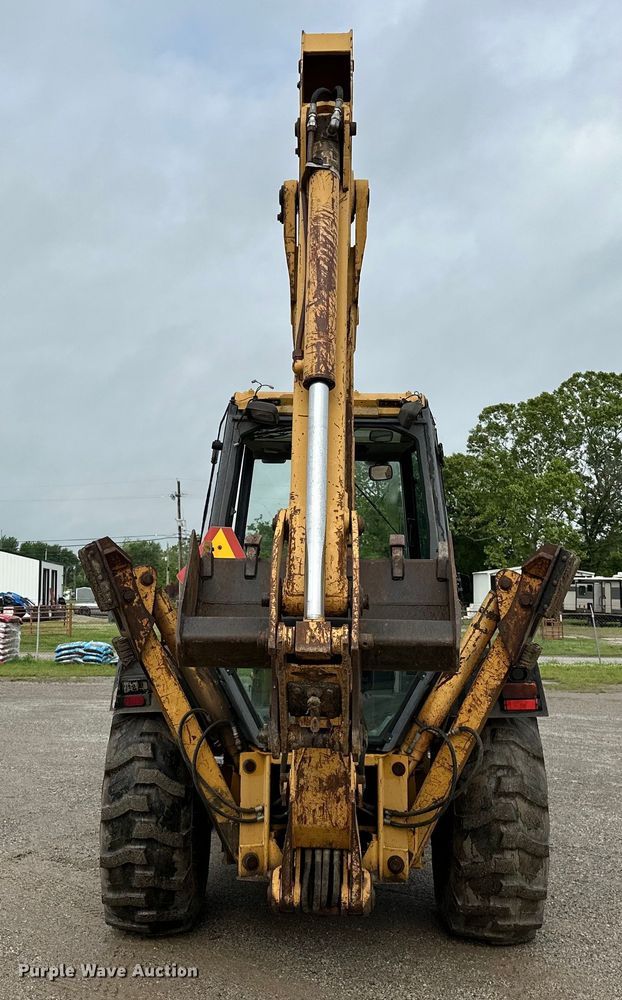 image for item NR9878 New Holland  575D backhoe