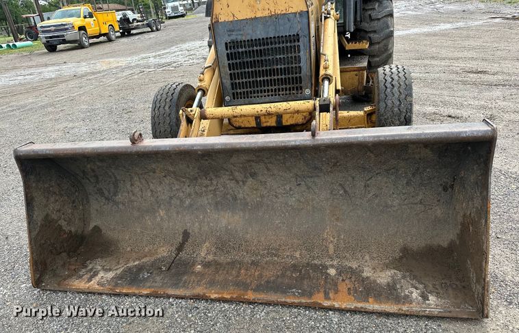 image for item NR9878 New Holland  575D backhoe