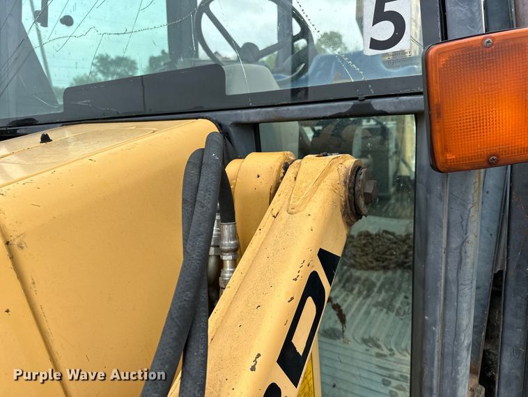 image for item NR9878 New Holland  575D backhoe