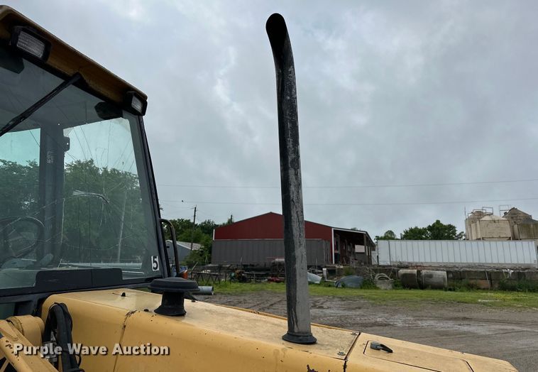 image for item NR9878 New Holland  575D backhoe