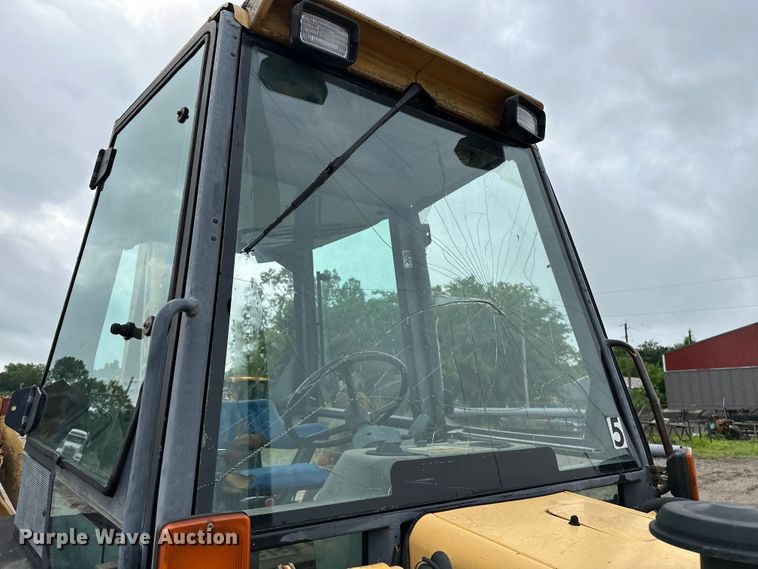 image for item NR9878 New Holland  575D backhoe