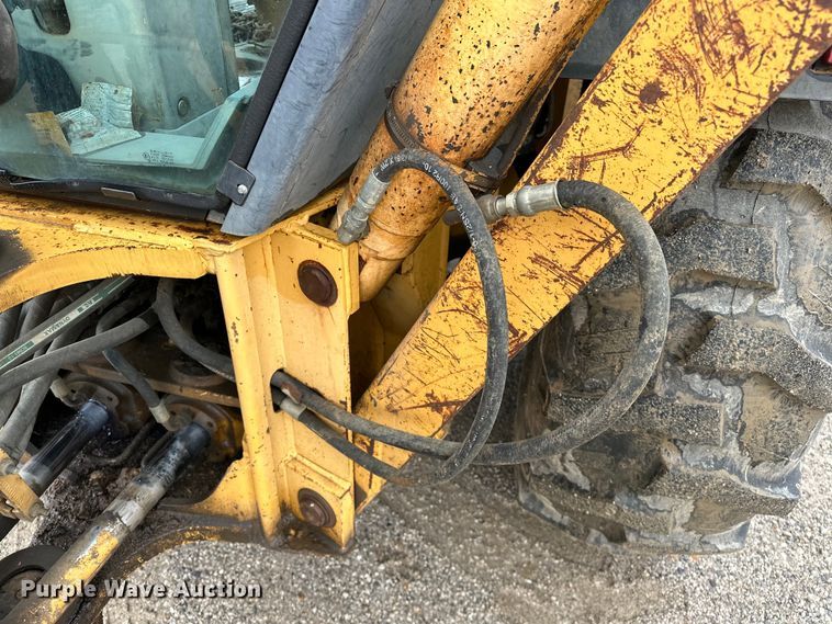 image for item NR9878 New Holland  575D backhoe