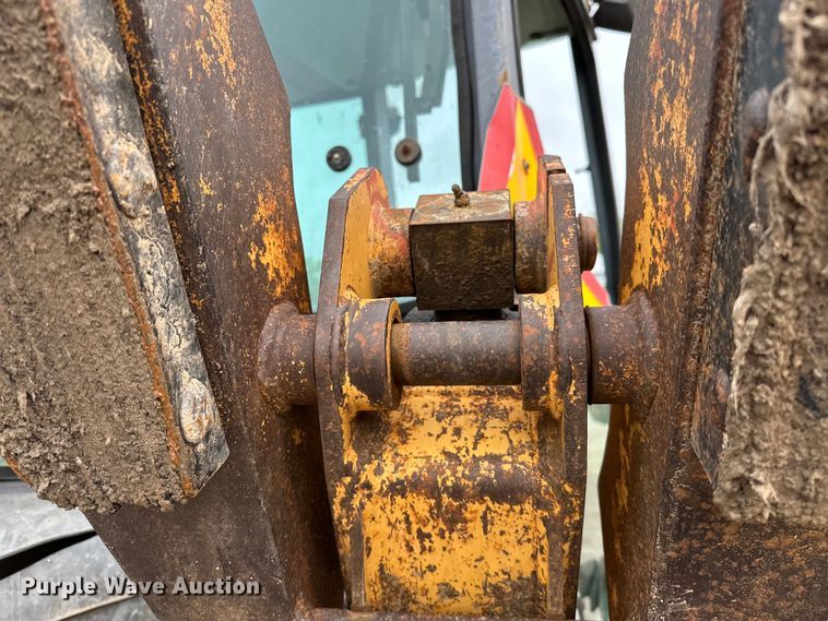 image for item NR9878 New Holland  575D backhoe