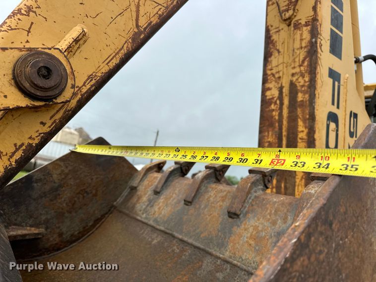 image for item NR9878 New Holland  575D backhoe